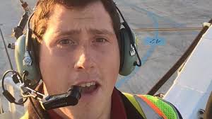 Ground operator Richard 'Beebo' Russell, wearing hi-vis jacket and headphones in an airport &ndash; he is the subject Skyking documentary on Hulu.