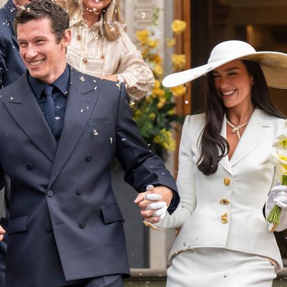 Dua Lipa wore a custom Schiaparelli skirt set to her wedding, inspired by Bianca Jagger