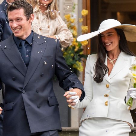 Dua Lipa wore a custom Schiaparelli skirt set to her wedding, inspired by Bianca Jagger