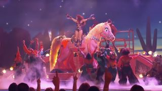 chappell roan on giant pink horse at grammys