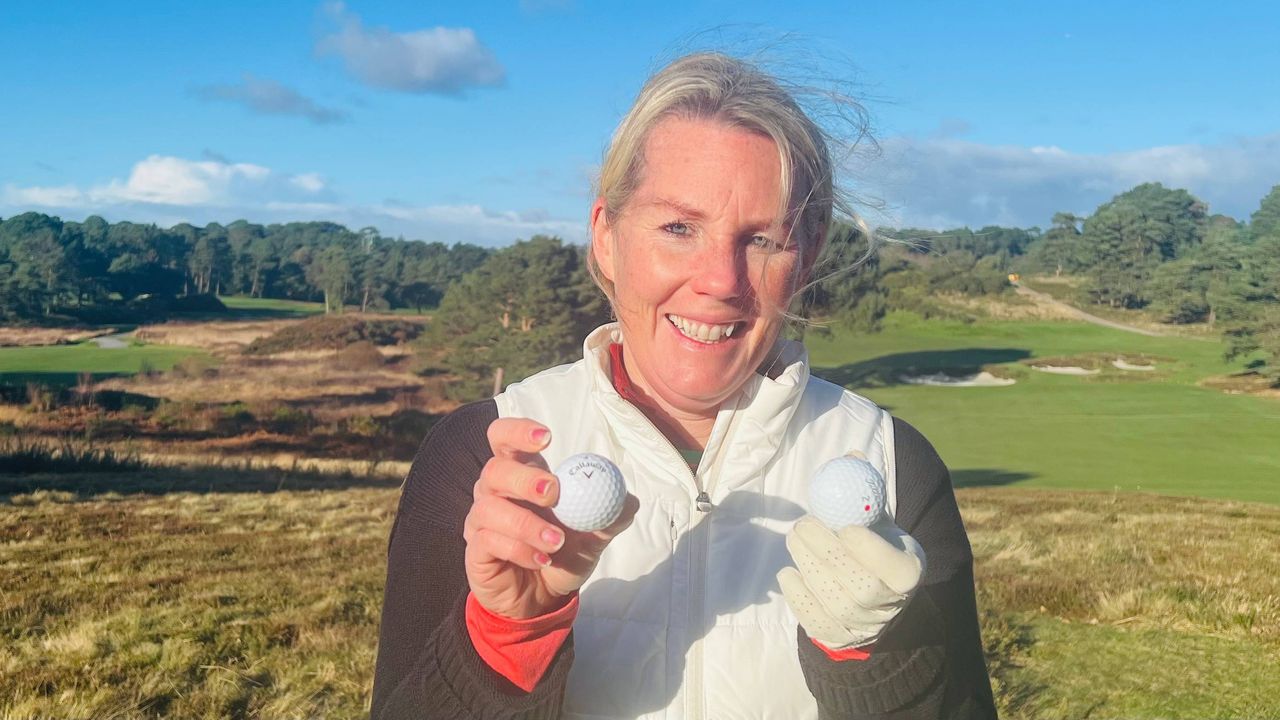 Carly Cummins holds two different golf balls