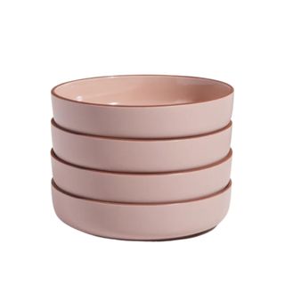 A stack of four pink plate bowls
