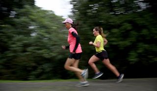 Two runners in a parkrun