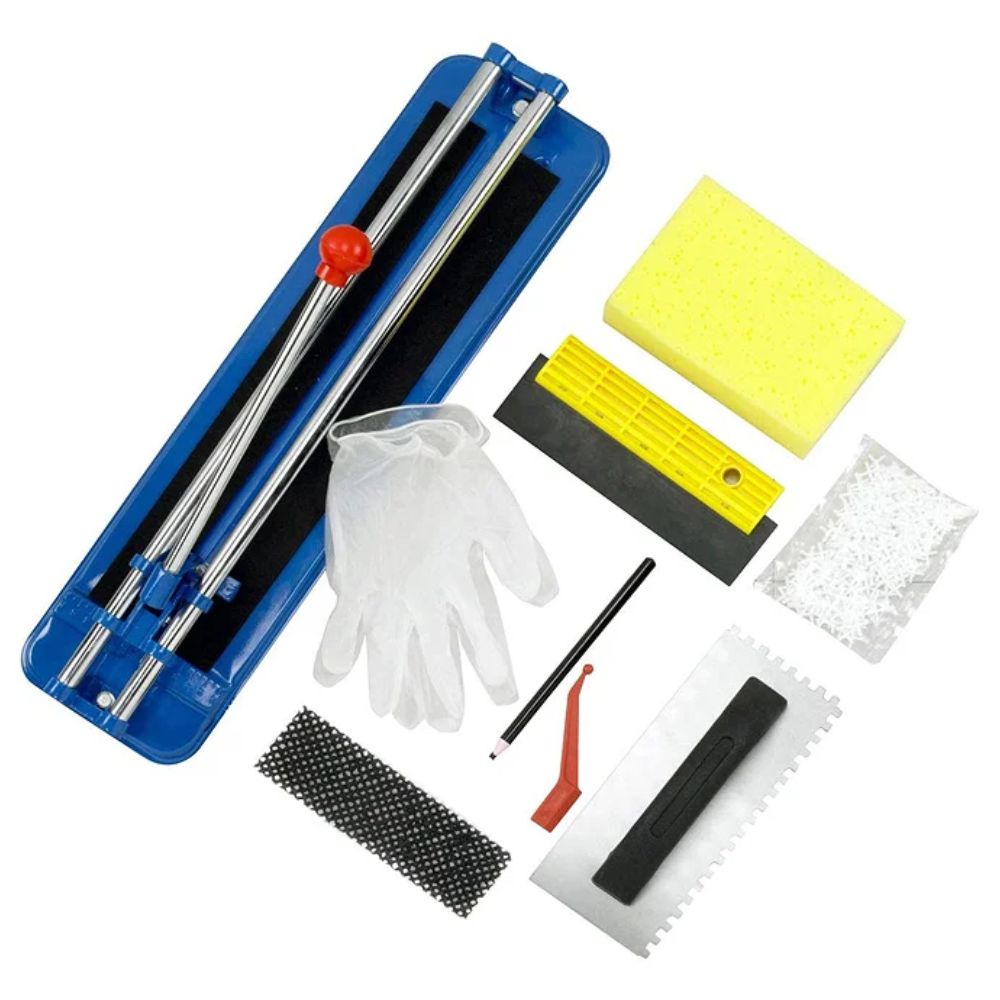 A tiling starter kit laid flat including a blue tile cutter, yellow sponge, rubber grout float, notched trowel, tile spacers, gloves and a scoring tool.