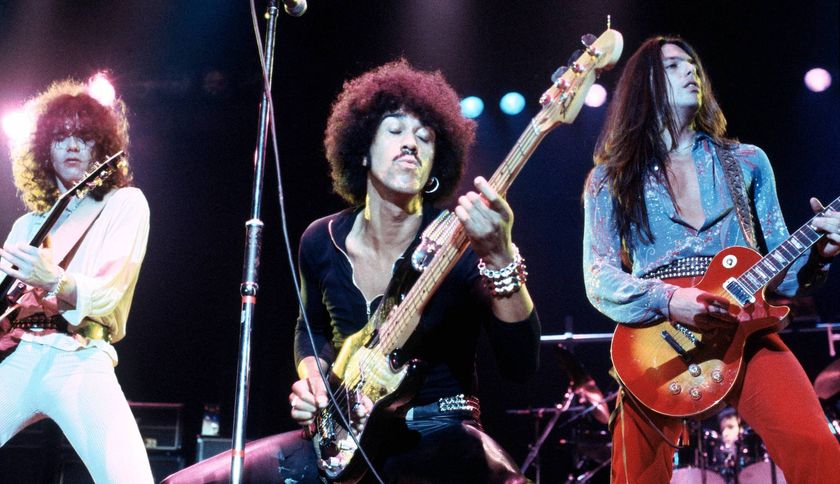 (from left) Thin Lizzy&#039;s Brian Robertson, Phil Lynott, and Scott Gorham perform onstage