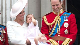 Catherine, Duchess of Cambridge, Princess Charlotte, Prince George and Prince William, Duke of Cambridge stand on the balcony of Buckingham Palace during the Trooping the Colour, this year marking the Queen's 90th birthday at The Mall on June 11, 2016 in London, England