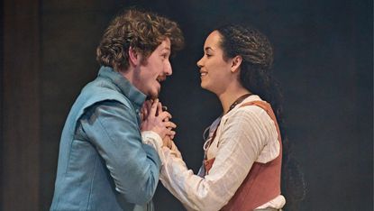 Tom Varey (William) and Madeleine Mantock (Agnes) in Hamnet 