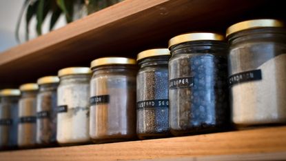 how to get rid of pantry moths - loose herbs in a pantry - heather-mckean-1I9bMlIAIBM-unsplash