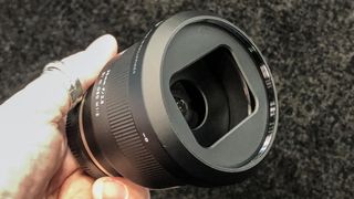 Tamron 35mm f/2.8 Di III OSD M1:2 has an unusual letterbox style lens hood