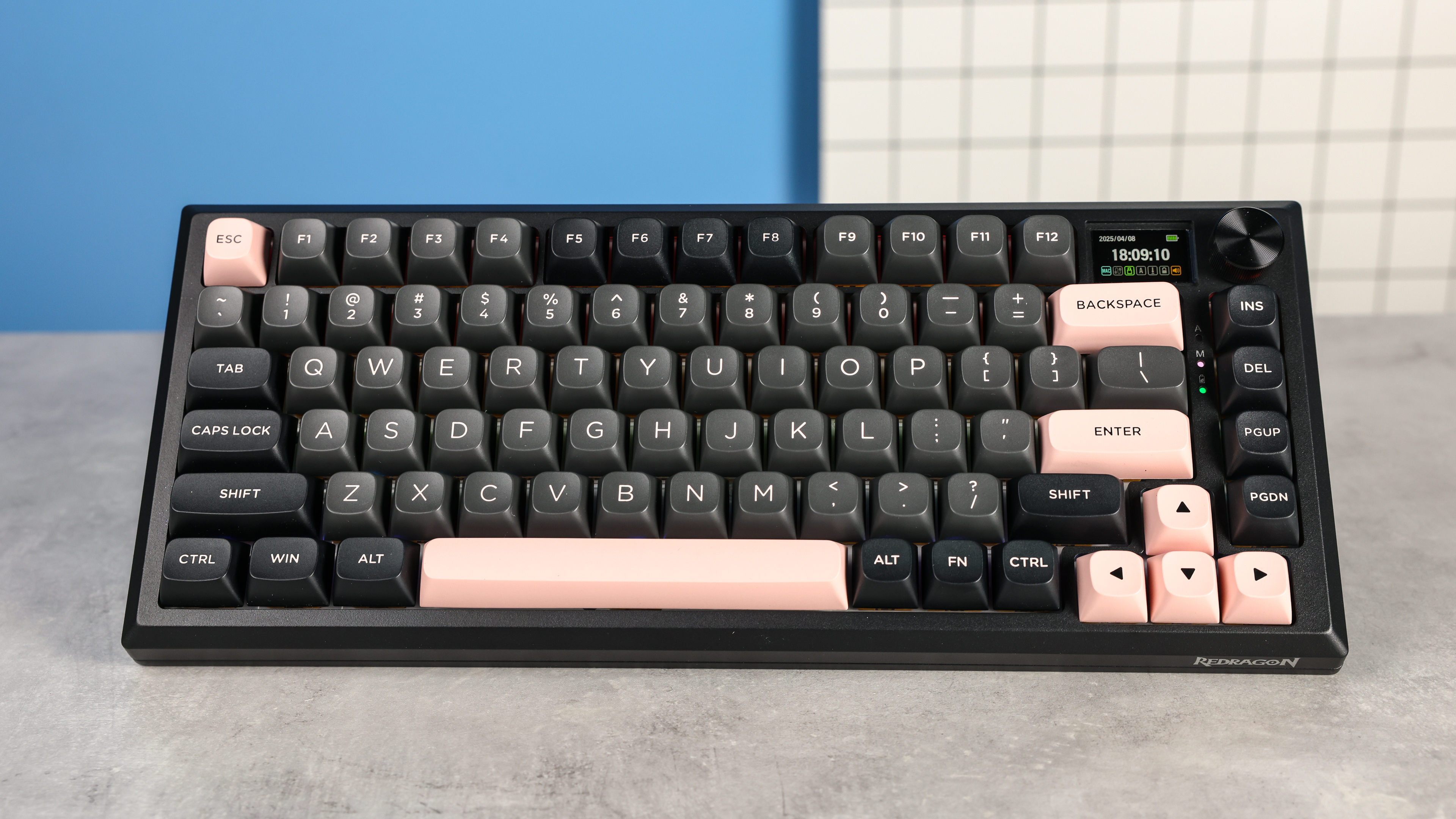 Redragon Eclipse K720 Pro photographed in front of a blue background.