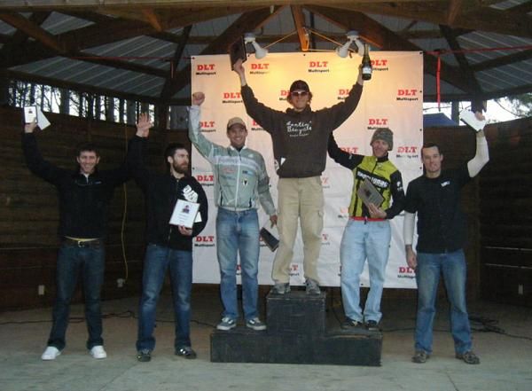 Evan Plews stands atop the men's podium.