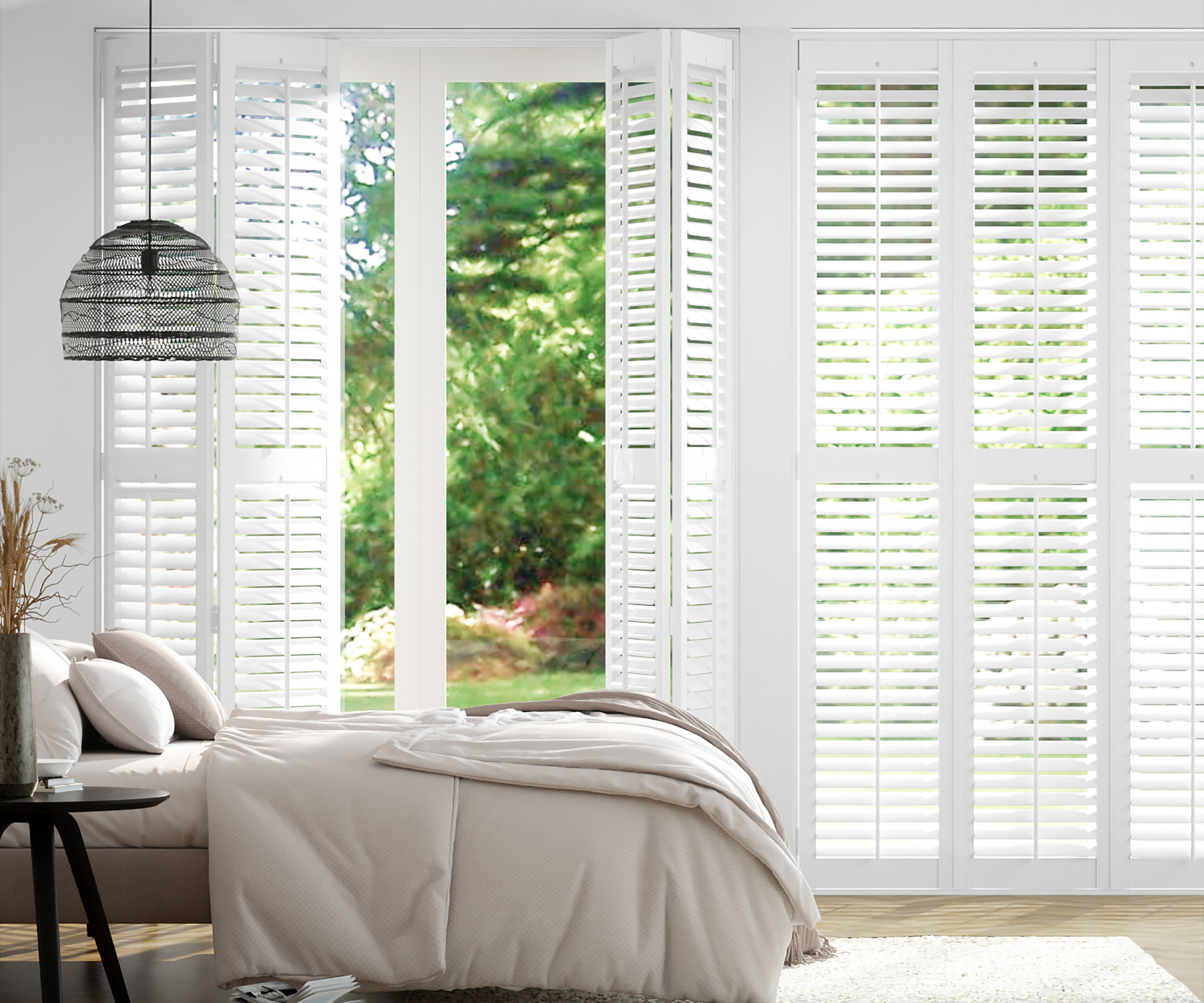 Full length white shutters in bedroom