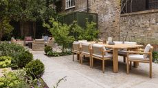 outdoor seating on a patio with plants