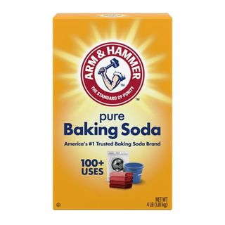 A yellow cardboard box of Arm & Hammer Pure Baking Soda