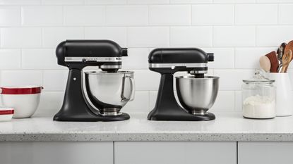 Image of KitchenAid Artisan Mini Stand Mixer in lifestyle shot compared to full size Artisan Stand Mixer 