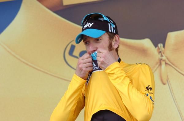 Bradley Wiggins (Team Sky) kisses yellow with one stage left in the race