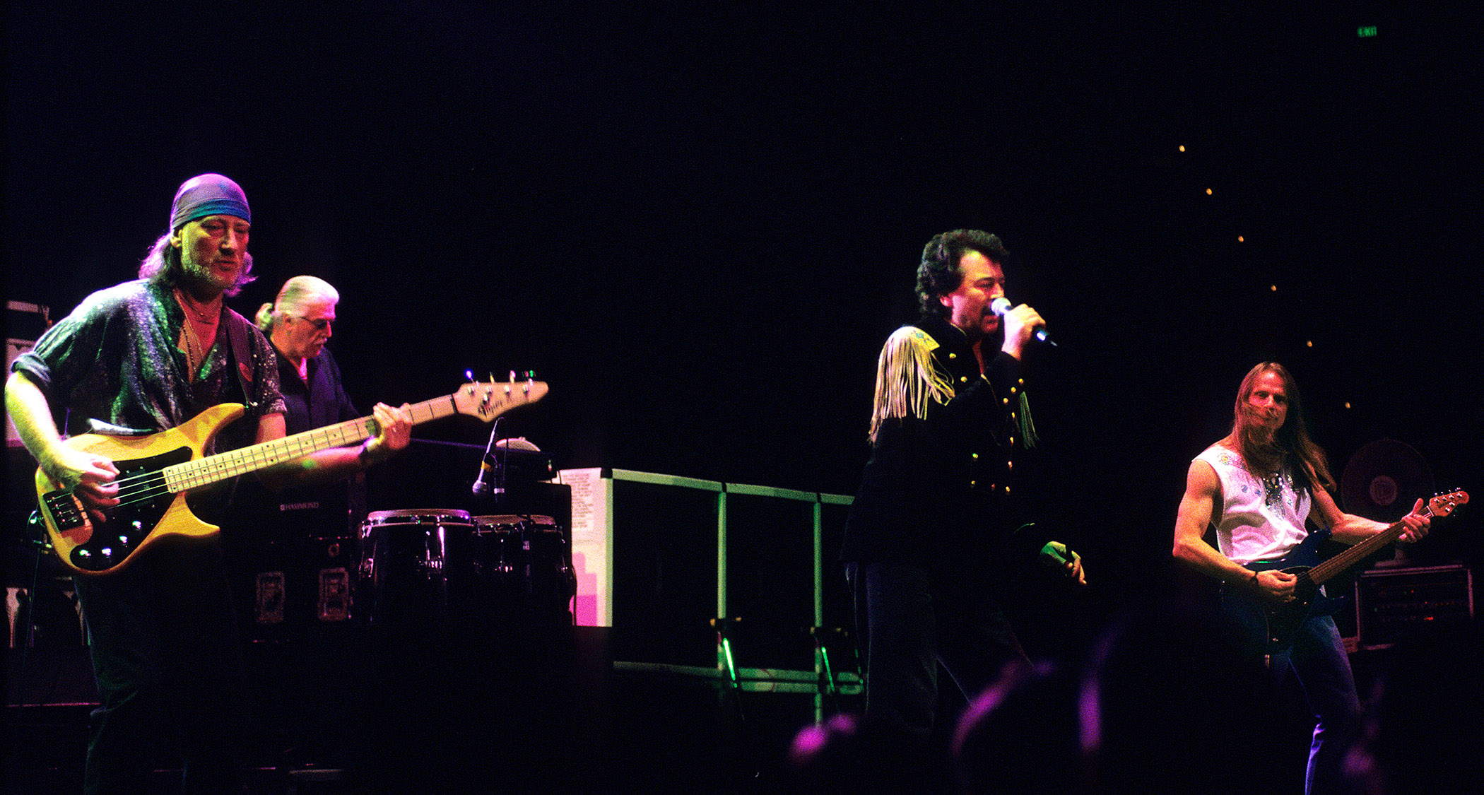 Deep Purple perform in Melbourne, Australia, in 1999, with the band fronted by Ian Gillan, who is flanked on the left by bassist Roger Glover and late organist Jon Lord, with Steve Morse on guitar to the right.