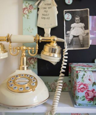 room with photo on wall and telephone