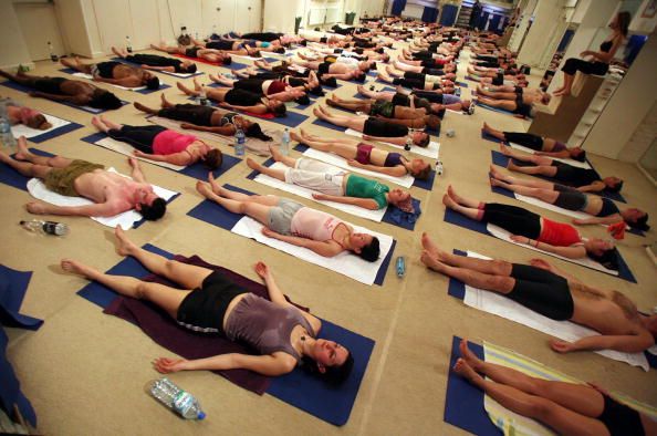 People doing hot yoga.