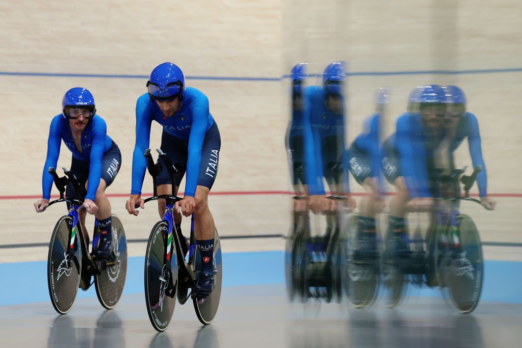 PARIS FRANCE AUGUST 06 LR Simone Consonni and Filippo Ganna of Team Italy react during the Mens Team Pursuit First Round on day eleven of the Olympic Games Paris 2024 at SaintQuentinenYvelines Velodrome on August 06 2024 in Paris France Photo by Tim de WaeleGetty Images