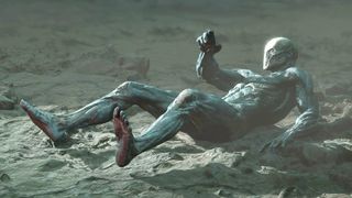 The Harbinger lies prone after losing his Shell in the Mortal Shell 2 prologue.
