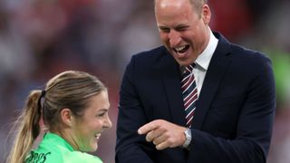 Prince William shares a joke with Mary Earps of England during the trophy presentation as he attends the UEFA Women's Euro 2022 final match