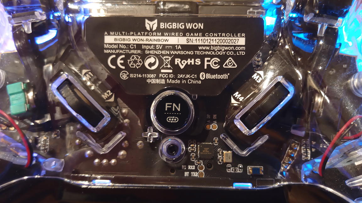 A photo of the BigBig Won Rainbow controller's rear details and functions