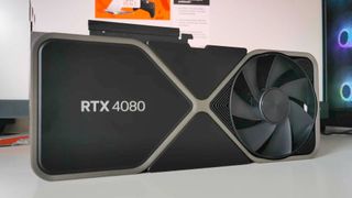 Nvidia RTX 4080 GPU sitting on white desk