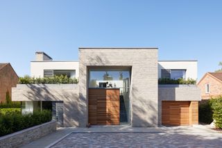 Contemporary garage with doors from Urban Front