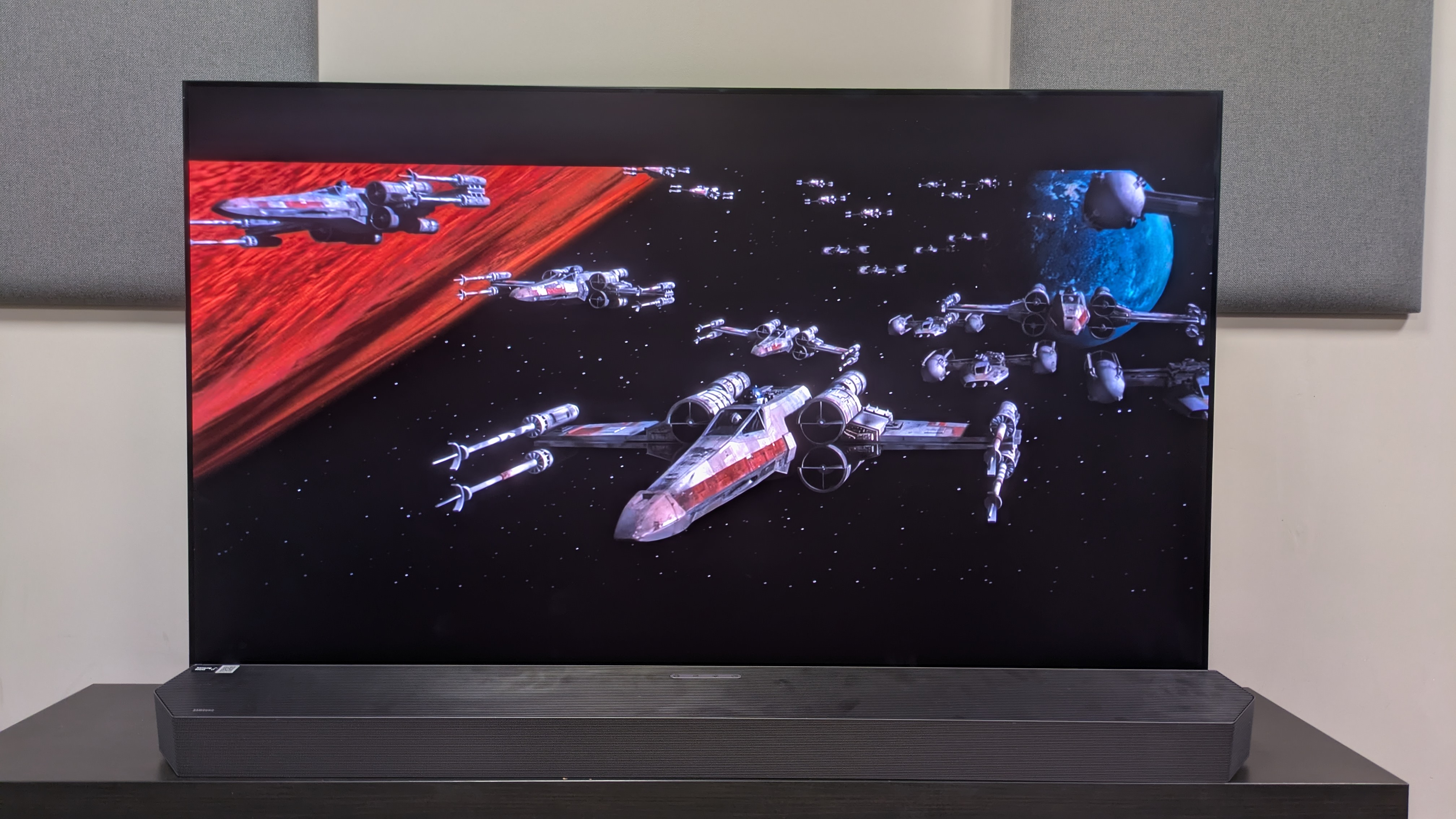Samsung HW-Q990H connected to Samsung S95F with Star Wars A New Hope on screen, showing X-Wings before Death Star attack