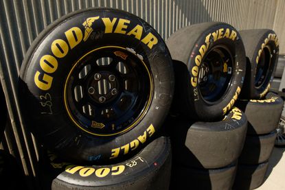 Goodyear Racing Eagle tires are stacked up along a wall during practice for the NASCAR Sprint Cup Series Allstate 400 at the Brickyard at Indianapolis Motor Speedway on July 25, 2009 in India