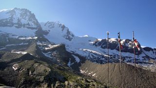 hut to hut hiking: view of Gran Paradiso from the Chabod Hut