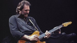 Steve Cropper performing with Dave Edmunds R&R Revue at the Warfield Theater in San Francisco on April 7, 1990. He plays a Peavey Generation guitar. 