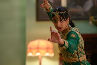 Priya Kansara as Ria Khan, in a fighting pose in Polite Society