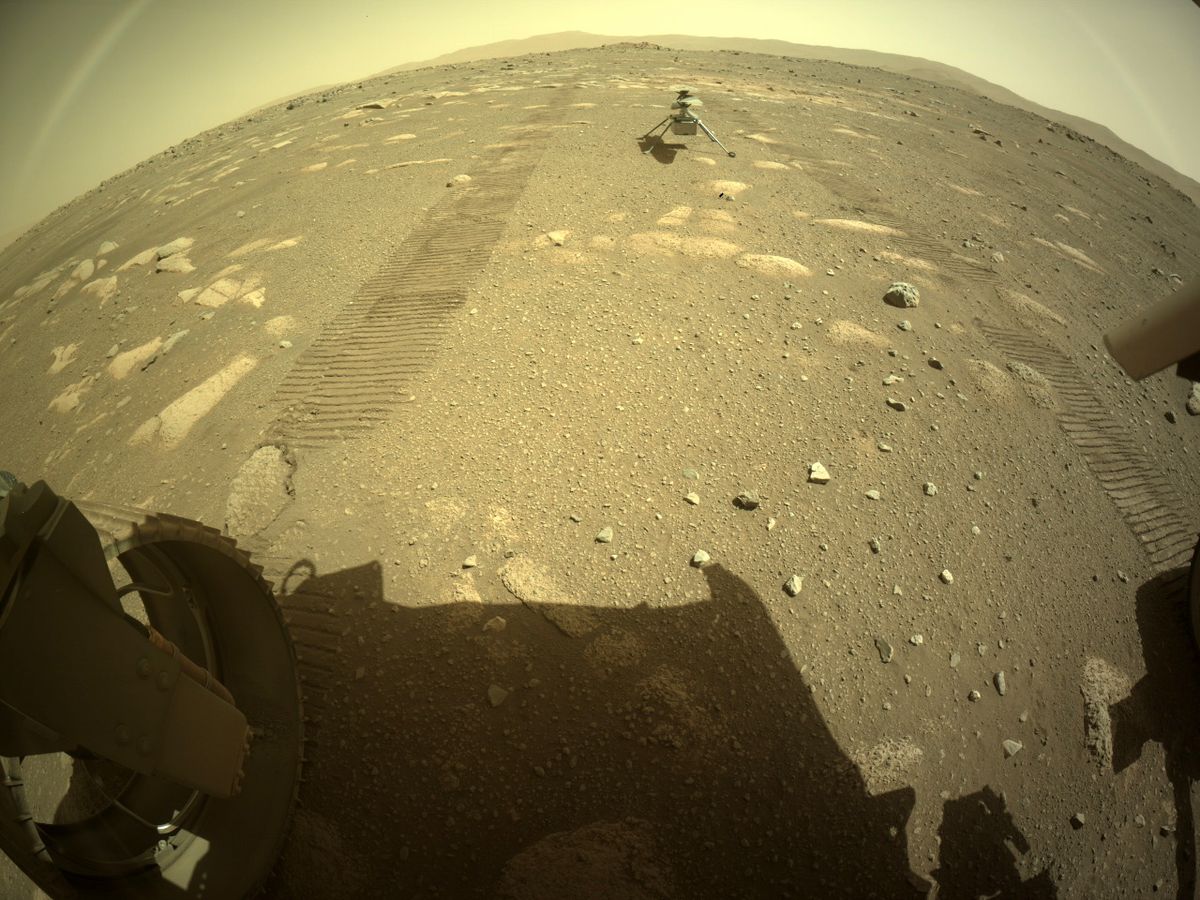 NASA's Mars Helicopter Ingenuity is seen on the surface of the Red Planet after being deployed by the Perseverance rover on April 4, 2021.