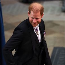Britain's Prince Harry, Duke of Sussex, arrives at Westminster Abbey in central London on May 6, 2023, ahead of the coronations of Britain's King Charles III and Britain's Camilla, Queen Consort. - The set-piece coronation is the first in Britain in 70 years, and only the second in history to be televised. Charles will be the 40th reigning monarch to be crowned at the central London church since King William I in 1066. Outside the UK, he is also king of 14 other Commonwealth countries, including Australia, Canada and New Zealand. Camilla, his second wife, will be crowned queen alongside him, and be known as Queen Camilla after the ceremony. (Photo by PHIL NOBLE / POOL / AFP) (Photo by PHIL NOBLE/POOL/AFP via Getty Images)
