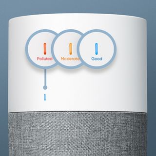A closeup of the Blueair Blue 3210 air purifier's LED light with overlaid examples of how the light changes colour to signify "Polluted", "Moderate", and "Good" air.