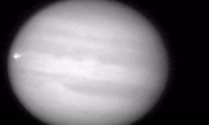 In this screen shot from an amateur astronomer's video, Jupiter appears to be hit by something, resulting in a two-second explosion.