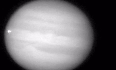 In this screen shot from an amateur astronomer&amp;#039;s video, Jupiter appears to be hit by something, resulting in a two-second explosion.