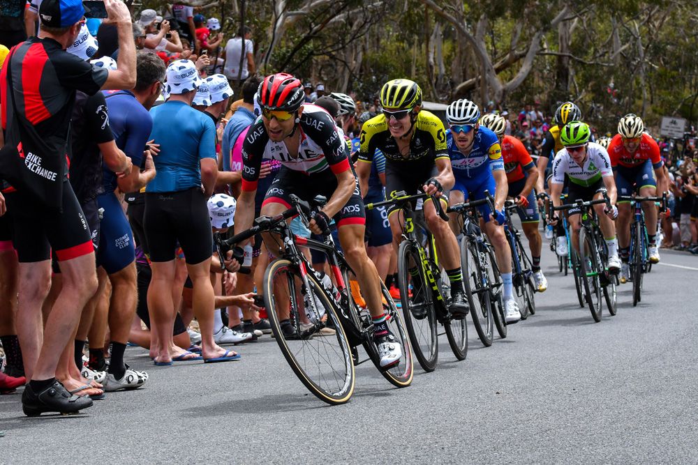 Impey follows Diego Ulissi before kicking away to the finish