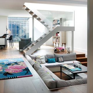 room with staircase and wooden flooring