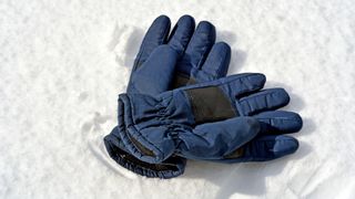 Ski gloves lying in the snow