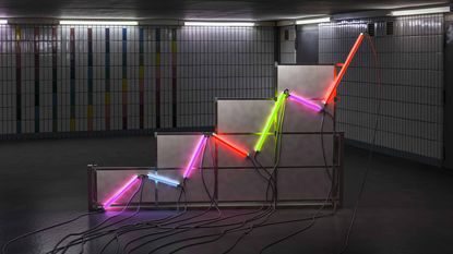 Different colored neon lights making a graph chart