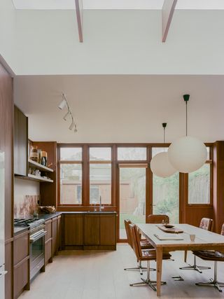 A mid-century style kitchen with track lighting
