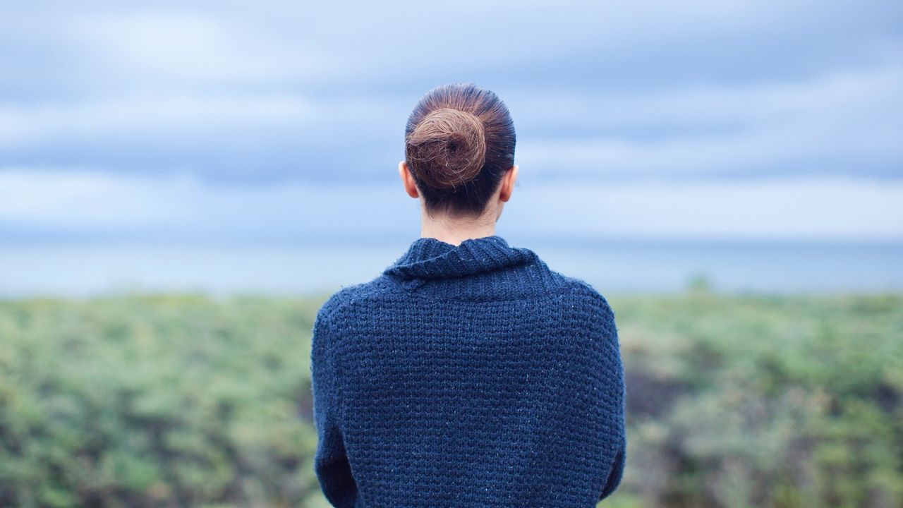 woman looking into the distance 