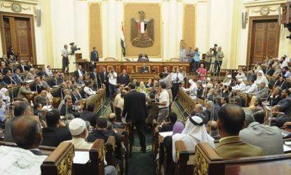 Egypt's disbanded parliament meets Tuesday, intensifying tensions between the military and President Mohamed Morsi.