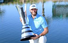 Dustin Johnson with the 2021 Saudi International trophy