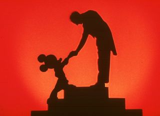 Fantasia - Mickey Mouse shakes hands with conductor Leopold Stokowski