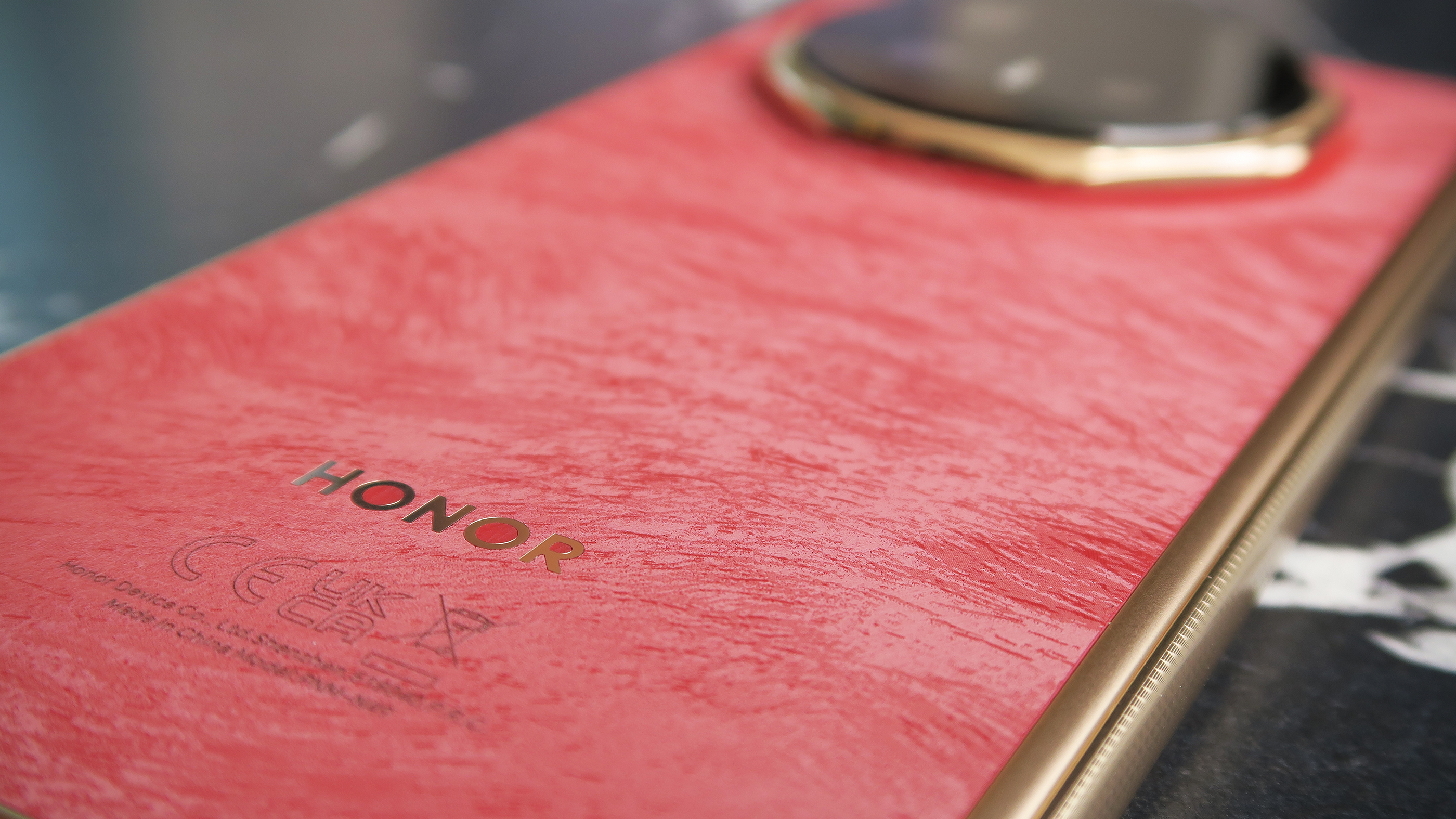 Honor Magic V6 hands on red finish macro