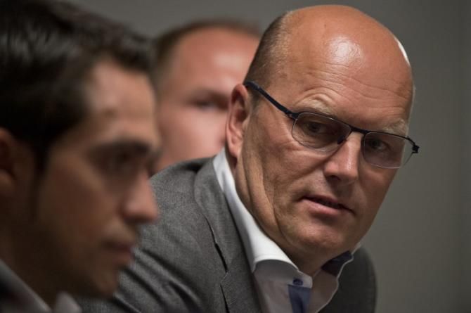 Bjarne Riis with Alberto Contador at a press conference in October 2013